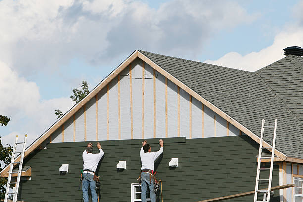 Professional Siding technician working in Canton, TX